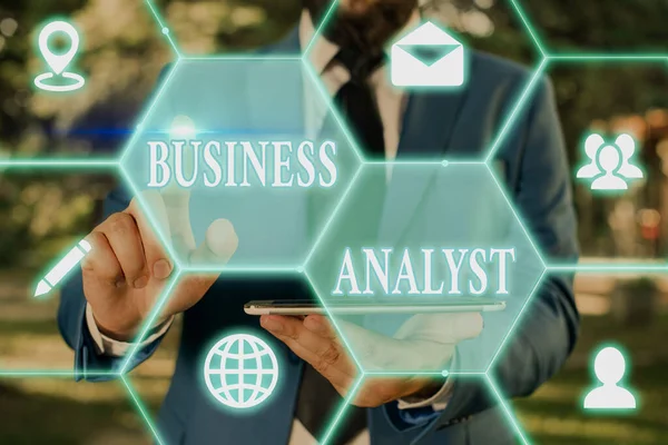 Writing note showing Business Analyst. Business photo showcasing someone who analyzes big organization or website domain.