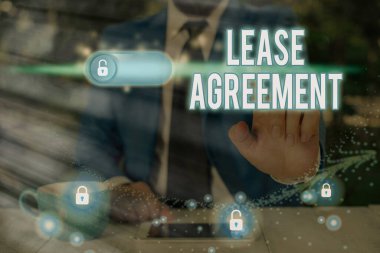 Kira sözleşmesini gösteren bir not yazıyorum. İş fotoğrafçılığı sözleşmesi kira sözleşmesini kabul ediyor..