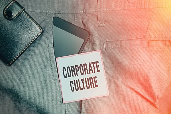 Word writing text Corporate Culture. Business concept for Beliefs and ideas that a company has Shared values Smartphone device inside trousers front pocket with wallet and note paper.