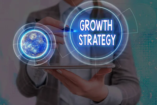 Conceptual hand writing showing Growth Strategy. Business photo text Strategy aimed at winning larger market share in shortterm Elements of this image furnished by NASA. — Stock Photo, Image
