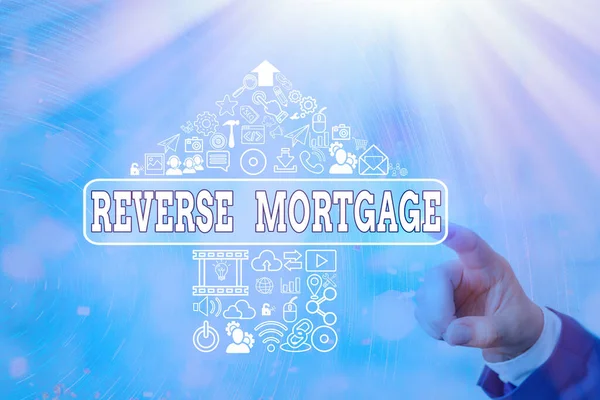 Handschriftliche Textschreiben Reverse Mortgage. Konzept bedeutet Kredit für Senioren ab 60 Jahren, der zurückgezahlt werden muss. — Stockfoto