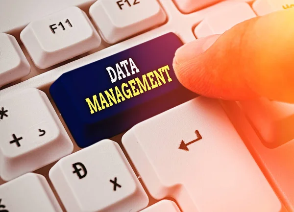 Text sign showing Data Management. Conceptual photo The practice of organizing and maintaining data processes.