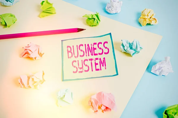 Conceptual hand writing showing Business System. Business photo showcasing A method of analyzing the information of organizations Colored crumpled paper empty reminder blue yellow clothespin. — Stock Photo, Image