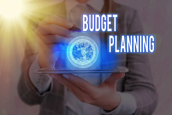 Text sign showing Budget Planning. Conceptual photo The written description about current and future expenses Elements of this image furnished by NASA. — Stock Photo, Image