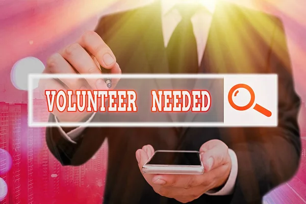 Handwriting text Volunteer Needed. Concept meaning Looking for helper to do task without pay or compensation.