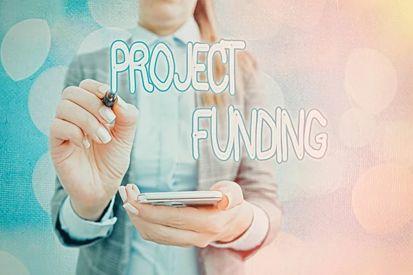 プロジェクト資金を示すテキスト記号。スタートアップのために支払う概念的な写真はそれを大きくし、成功させる. — ストック写真