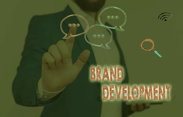 Text sign showing Brand Development. Conceptual photo Defining the product to excel in the market Promoting.