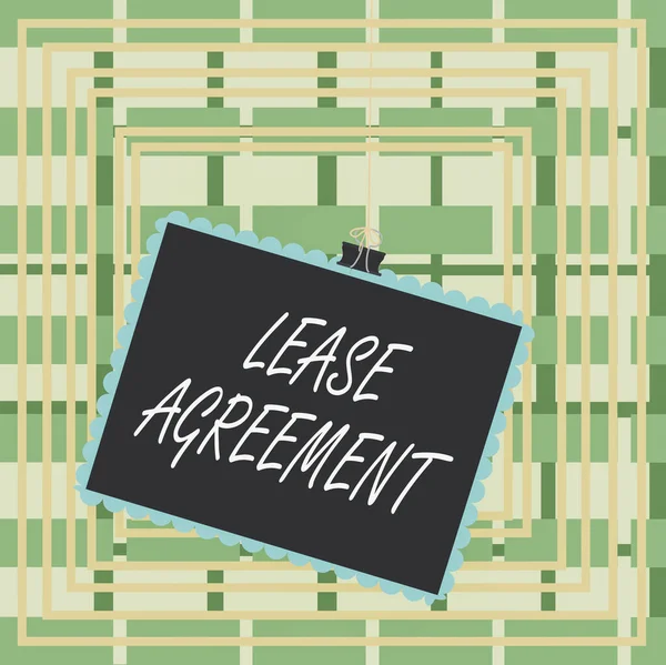 Text sign showing Lease Agreement. Conceptual photo Contract on the terms to one party agrees rent property Stamp stuck binder clip paper clips square color frame rounded tip sticker. — Stock Photo, Image