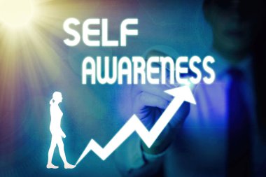 Kişisel Farkındalık 'ı yazan el yazısı. Kişinin bir duruma ya da olaya karşı bilincinin olması anlamına gelir..