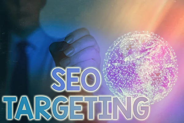 Escritura a mano de texto Seo Targeting. Concepto significado Palabras clave específicas para la ubicación Página de aterrizaje Top Domain Elementos de esta imagen proporcionados por la NASA . — Foto de Stock