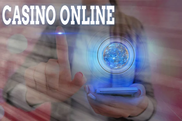 Word writing text Casino Online. Business concept for Computer Poker Game Gamble Royal Bet Lotto High Stakes Elements of this image furnished by NASA. — Stock Photo, Image