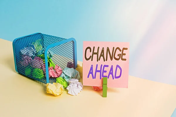 Writing note showing Change Ahead. Business photo showcasing Some alterations waiting to happen Perspective Standby Trash bin crumpled paper clothespin reminder office supplies.