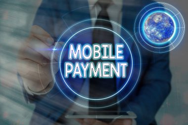 Mobil ödemeyi gösteren kavramsal el yazısı. NASA tarafından desteklenen bu görüntünün taşınabilir elektronik cihazları aracılığı ile yapılan Nakitsiz Ödeme.