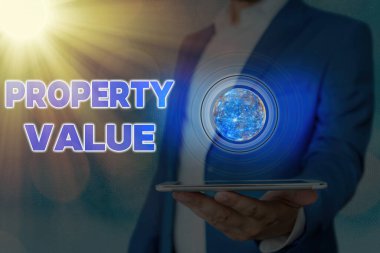 Özellik Değeri el yazısı metni. Bir arazi değeri anlamına gelen kavram Emlak Adil piyasa değeri Bu imajın elementleri NASA tarafından döşenmiştir.