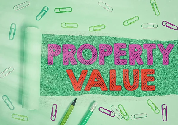 Nota de escritura que muestra el valor de la propiedad. Foto de negocios mostrando Worth of a land Valoración inmobiliaria Precio justo de mercado . — Foto de Stock