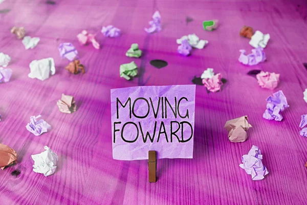 Handwriting text writing Moving Foward. Concept meaning Towards a Point Move on Going Ahead Further Advance Progress. — Stock Photo, Image