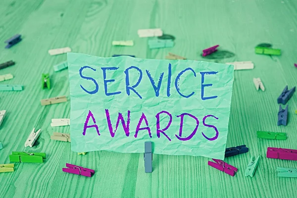 Word writing text Service Awards. Business concept for Recognizing an employee for his or her longevity or tenure.