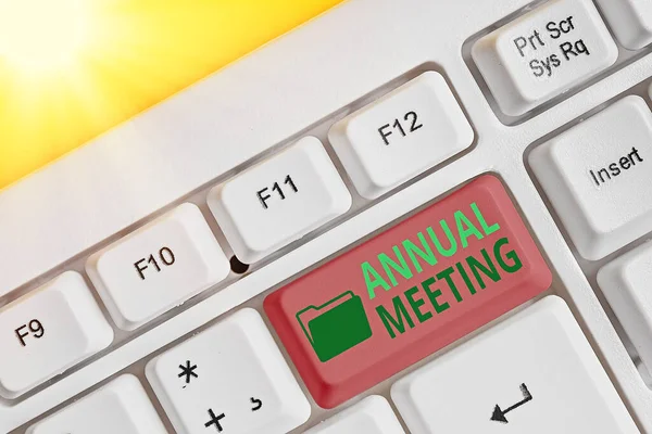 Writing note showing Annual Meeting. Business photo showcasing Yearly gathering of an organization interested shareholders.