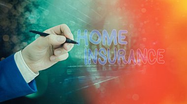 Ev Sigortasını gösteren bir mesaj. Kavramsal fotoğraf evdeki kazaları ve hasarları kapsıyor..