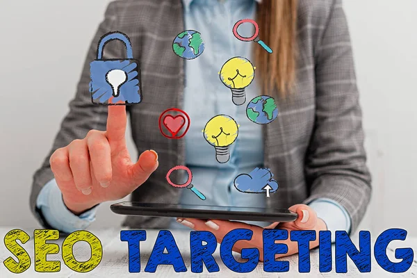 Escritura manual conceptual que muestra Seo Targeting. Foto de negocios mostrando Palabras clave específicas para la ubicación Página de aterrizaje Dominio superior . — Foto de Stock