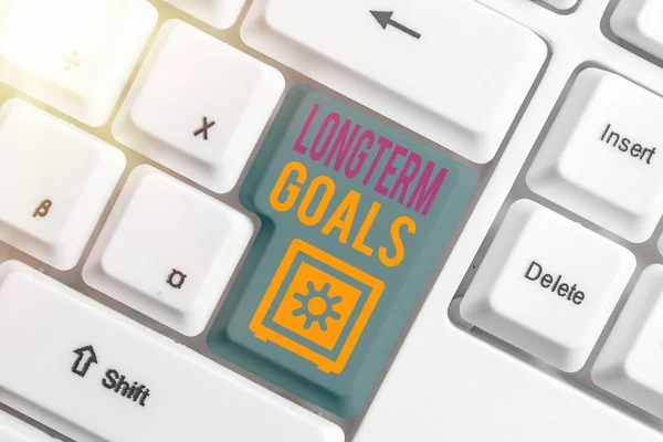Writing note showing Longterm Goals. Business photo showcasing Strategic target that is required more time for completion. — Stock Photo, Image