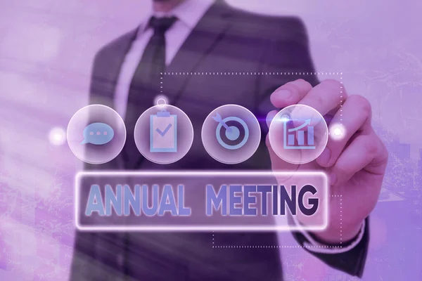 Handwriting text Annual Meeting. Concept meaning Yearly gathering of an organization interested shareholders.