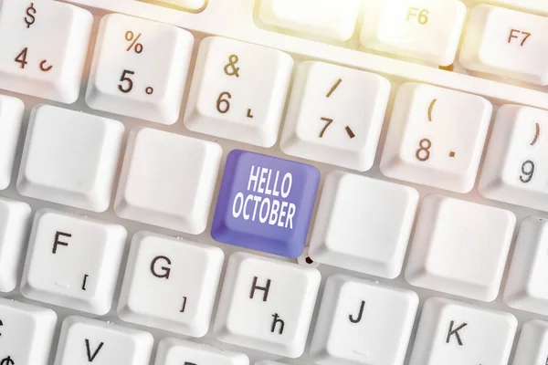 Escribiendo nota mostrando Hello October. Foto de negocios mostrando Último trimestre décimo mes 30days Season Greeting . —  Fotos de Stock