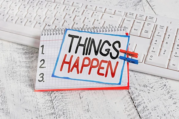 Text sign showing Things Happen. Conceptual photo Result of situation Course of action Something cannot control notebook paper reminder clothespin pinned sheet white keyboard light wooden. — Stock Photo, Image