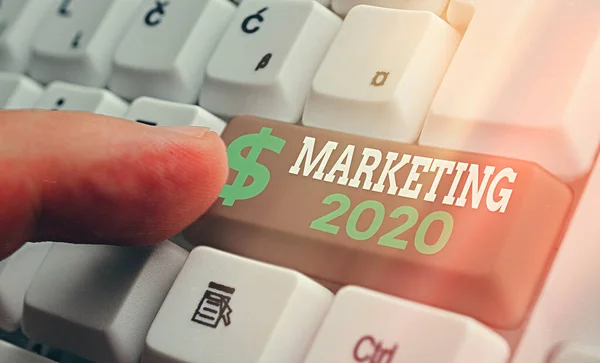 Conceptual hand writing showing Marketing 2020. Business photo showcasing Commercial trends for 2020 New Year promotional event.