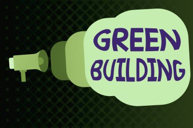 Green Building 'i gösteren bir not yazıyorum. Çevreye duyarlı bir yapıyı gösteren iş fotoğrafı. Sürdürülebilir megafon zarftan çıkıyor. Duyuru ve konuşma..