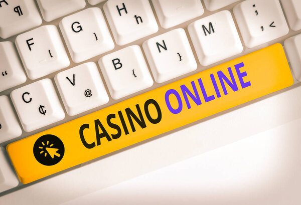 Handwriting text writing Casino Online. Concept meaning Computer Poker Game Gamble Royal Bet Lotto High Stakes.