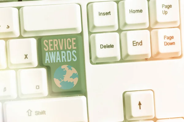 Word writing text Service Awards. Business concept for Recognizing an employee for his or her longevity or tenure.