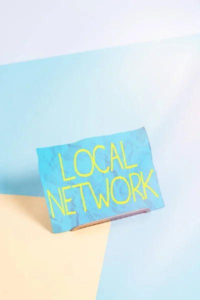 Konceptuell handstil som visar Local Network. Affärsfoto showcasing Intranät LAN Radio Waves DSL Boradband Switch Connection Papper på bufferttråd på mjuk pastell flera färger bakgrund. — Stockfoto