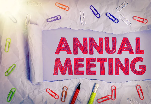 Handwriting text Annual Meeting. Concept meaning Yearly gathering of an organization interested shareholders.