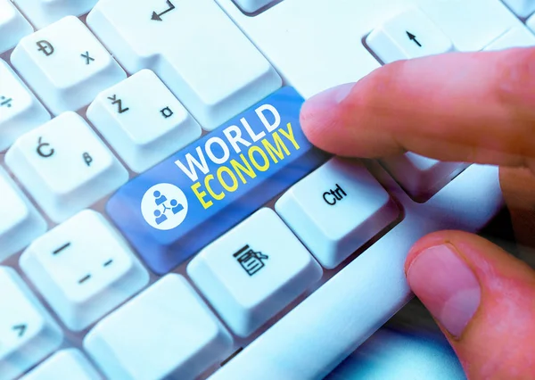 Signo de texto mostrando la economía mundial. Foto conceptual Global Mundial Mercados internacionales comercio cambio de dinero . —  Fotos de Stock