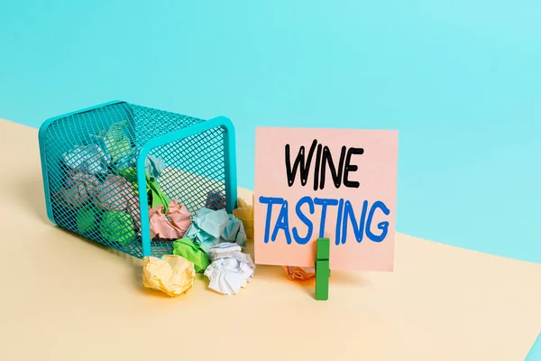 Writing note showing Wine Tasting. Business photo showcasing Degustation Alcohol Social gathering Gourmet Winery Drinking Trash bin crumpled paper clothespin reminder office supplies. — Stock Photo, Image