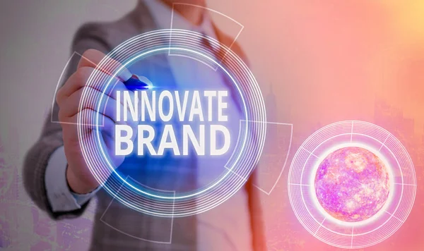 Escritura a mano conceptual que muestra Innovate Brand. Texto fotográfico de negocios significativo para innovar productos, servicios y más Elementos de esta imagen proporcionados por NASA . — Foto de Stock