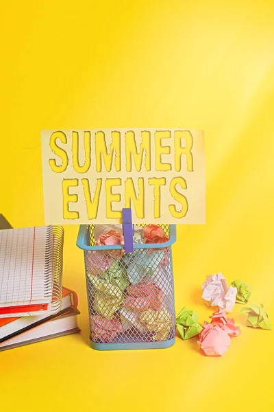 Writing note showing Summer Events. Business photo showcasing Celebration Events that takes place during summertime Trash bin crumpled paper clothespin office supplies yellow.