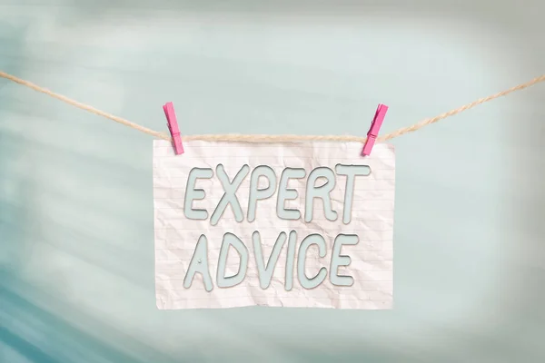 Handwriting text Expert Advice. Concept meaning Sage Good Word Professional opinion Extensive skill Ace Clothesline clothespin rectangle shaped paper reminder white wood desk. — Stock Photo, Image