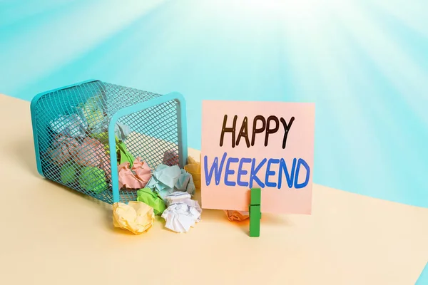 Writing note showing Happy Weekend. Business photo showcasing Cheerful rest day Time of no office work Spending holidays Trash bin crumpled paper clothespin reminder office supplies.
