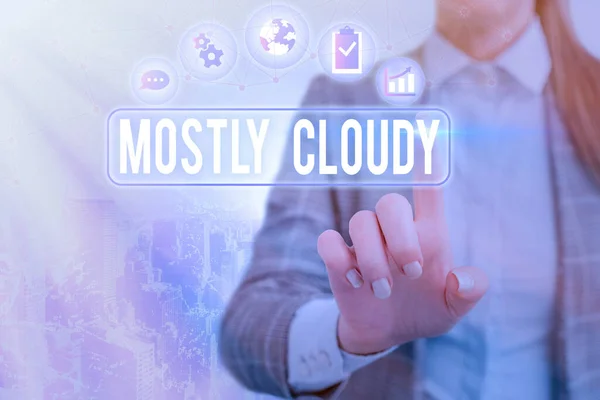 Texto de escritura de palabras Mayormente nublado. Concepto de negocio para Shadowy Vaporous Noggy Fluffy Nebulous Clouds Skyscape . — Foto de Stock