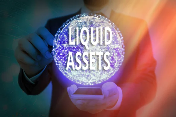 Escrita à mão escrita de texto Liquid Assets. Conceito que significa Dinheiro e Balanças Bancárias Liquidez de Mercado Stock diferido Elementos desta imagem fornecidos pela NASA . — Fotografia de Stock