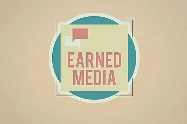 Writing note showing Earned Media. Business photo showcasing Publicity gained through promotional efforts by multimedia Two Speech Bubble Overlapping on Square Shape above a Circle.