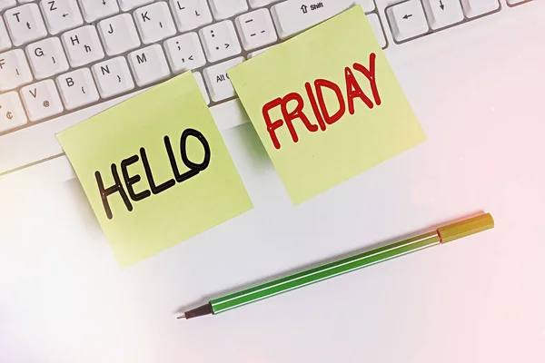 Writing note showing Hello Friday. Business photo showcasing used to express happiness from beginning of fresh week Square green note paper with pencil on the white background.