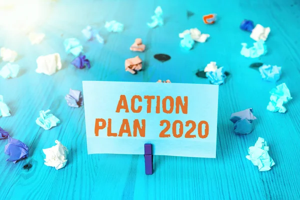 Woord schrijven tekst Actieplan 2020. Bedrijfsconcept voor voorgestelde strategie of actielijn voor het lopende jaar. — Stockfoto