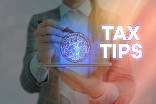 Writing note showing Tax Tips. Business photo showcasing compulsory contribution to state revenue levied by government Elements of this image furnished by NASA. — Stock Photo, Image