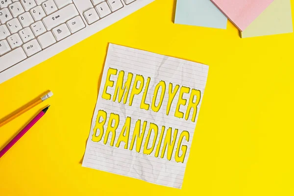 Word writing text Employer Branding. Business concept for promoting company employer choice to desired target group Copy space on notebook above yellow background with pc keyboard on the table.