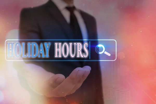 Tekst schrijven Holiday Hours. Bedrijfsconcept voor overwerk voor werknemers met flexibele werktijden. — Stockfoto