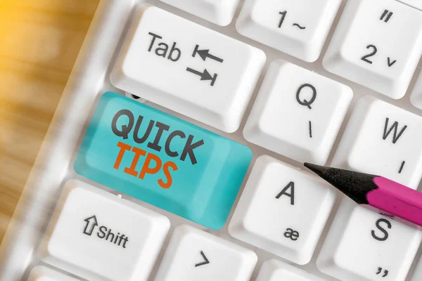 Writing note showing Quick Tips. Business photo showcasing small but particularly useful piece of practical advice. — Stock Photo, Image