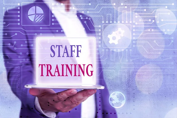 Text sign showing Staff Training. Conceptual photo learn specific knowledge improve performance in current roles.